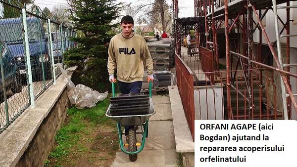 AGAPE orphans (here Bogdan) helping orphanage roof repair